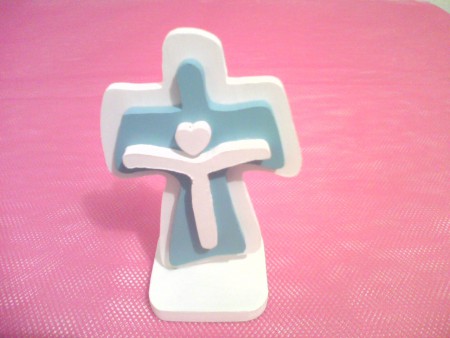 Cruz disponible en color azul y rosa